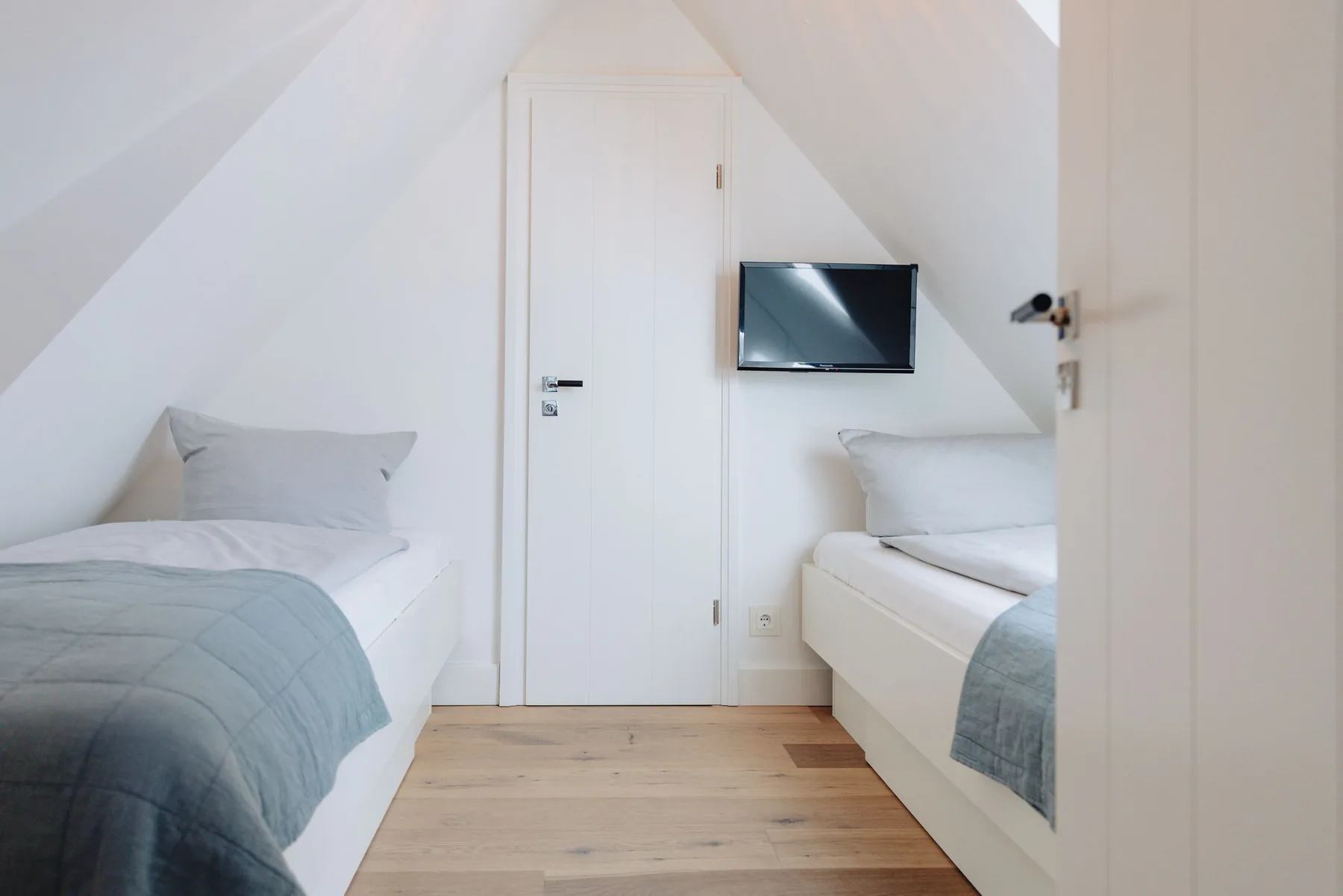 Ferienwohnung Wellenbrecher Sylt – Einzelbetten im Dachgeschoss
